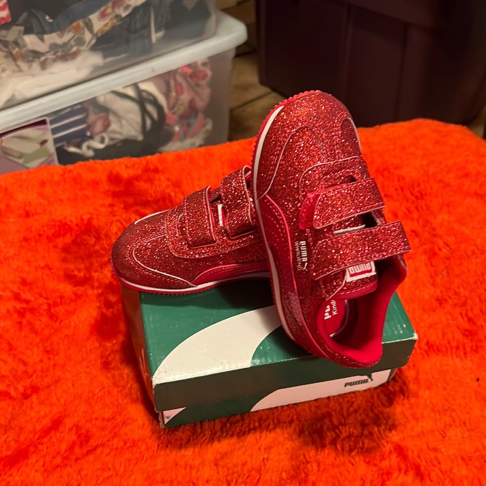 Sparkling Red Puma tennis shoes. Size 7 new no tags